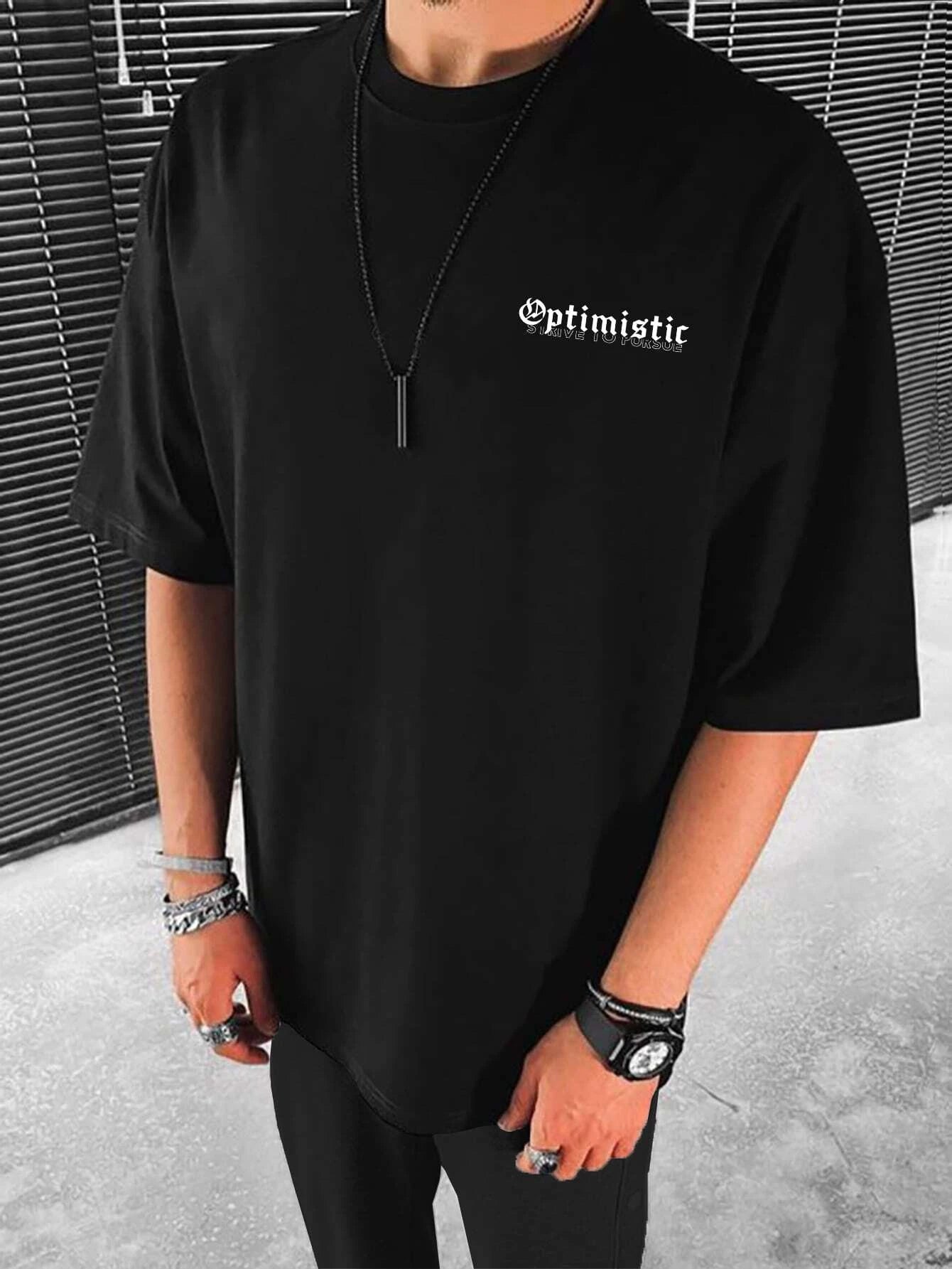 OPTIMISTIC OVERSIZED T-SHIRT - BLACK