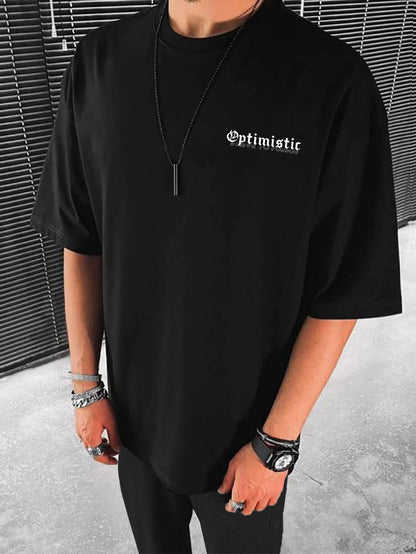 OPTIMISTIC OVERSIZED T-SHIRT - BLACK